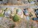 Aerial view of the property showcasing the house, backyard with deck, and surrounding neighborhood at 333 7Th Nw St, Hickory, NC 28601