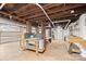 Unfinished basement with exposed pipes and brick pillar at 333 7Th Nw St, Hickory, NC 28601