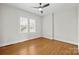 Well-lit bedroom features hardwood floors and neutral paint at 333 7Th Nw St, Hickory, NC 28601