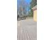 Wooden deck with peeling grey paint and a view of the backyard at 333 7Th Nw St, Hickory, NC 28601