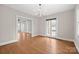 Classic dining room showcasing hardwood floors, a chandelier, and easy access to other living spaces at 333 7Th Nw St, Hickory, NC 28601