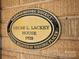 Close up of the Oakwood Historic District's marker noting the Oscar L. Lackey House built in 1928 at 333 7Th Nw St, Hickory, NC 28601