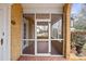 Bright and airy screened-in porch featuring detailed brick floor, and view of the neighborhood at 333 7Th Nw St, Hickory, NC 28601