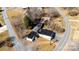 Aerial view of the property showing the building, road, and trees at 4238 Johnson Bridge Rd, Hickory, NC 28602
