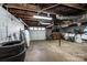 A spacious basement with concrete floors, and ample room for storage or customization at 4238 Johnson Bridge Rd, Hickory, NC 28602