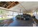 Large covered carport with space for multiple vehicles, offering protection from the elements at 4238 Johnson Bridge Rd, Hickory, NC 28602