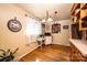 Eat-in kitchen features bright natural light and white wicker breakfast table at 4238 Johnson Bridge Rd, Hickory, NC 28602