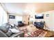 Cozy living room features plush seating, a modern fireplace, and natural light at 4238 Johnson Bridge Rd, Hickory, NC 28602