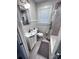 Clean bathroom includes a shower-tub combo and vanity sink at 4317 Ruskin Dr, Charlotte, NC 28209
