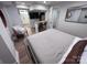 Inviting bedroom with a queen-size bed, kitchenette, and a modern bathroom, creating a comfortable retreat at 4317 Ruskin Dr, Charlotte, NC 28209