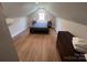 Comfortable bedroom with hardwood floors, neutral paint, and ample natural light at 4317 Ruskin Dr, Charlotte, NC 28209