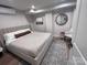 Bright bedroom with a comfortable bed, natural light, and stylish black and white rug at 4317 Ruskin Dr, Charlotte, NC 28209