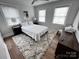 Bright bedroom with hardwood floors and ample natural light at 4317 Ruskin Dr, Charlotte, NC 28209