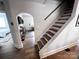 Welcoming foyer with staircase leading to the upper level at 4317 Ruskin Dr, Charlotte, NC 28209