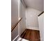 Hallway with hardwood floors and natural light leads to other areas of the home at 4317 Ruskin Dr, Charlotte, NC 28209