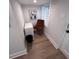 Bright hallway with natural light, a stylish chair, and sleek modern decor at 4317 Ruskin Dr, Charlotte, NC 28209