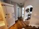 Hallway view showcasing bathroom and doorway to bedroom at 4317 Ruskin Dr, Charlotte, NC 28209