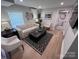 Relaxing living room features comfortable seating, modern decor, and bright natural light at 4317 Ruskin Dr, Charlotte, NC 28209