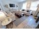 Cozy living room with comfortable seating, natural light, and modern decor at 4317 Ruskin Dr, Charlotte, NC 28209