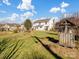 Large backyard with a lush lawn and mature trees, ideal for outdoor activities and relaxation at 4540 Hounds Run Dr, Matthews, NC 28105