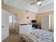 Another angle of the bedroom with a tray ceiling, fan, and built-in storage at 4540 Hounds Run Dr, Matthews, NC 28105