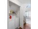 Convenient laundry room features a washer, dryer, and shelving for storage at 4540 Hounds Run Dr, Matthews, NC 28105