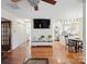 Open-concept floorplan showcases the living room and kitchen with hardwood flooring at 4540 Hounds Run Dr, Matthews, NC 28105