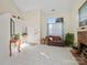 Bright living room featuring marble flooring, large windows, and elegant decor at 4540 Hounds Run Dr, Matthews, NC 28105