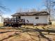 View of the back of the house, including a deck at 506 Bond St, Cherryville, NC 28021