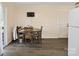 Kitchen dining area boasts neutral paint, vinyl floors, and access to the backyard at 506 Bond St, Cherryville, NC 28021