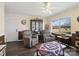 Cozy living room with ample natural light, ceiling fan, and views of the neighborhood at 506 Bond St, Cherryville, NC 28021