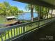 Stunning lake view from a porch, overlooking a private boat dock and scenic shoreline at 5153 Glenwood St, Sherrills Ford, NC 28673