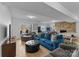 Spacious living room with a stone fireplace, game tables, and a view of the lake at 5153 Glenwood St, Sherrills Ford, NC 28673