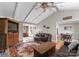 Comfortable living room with hardwood floors, ceiling fan, and view into eat in kitchen at 5153 Glenwood St, Sherrills Ford, NC 28673