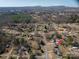 Aerial view of a neighborhood featuring cozy homes and natural surroundings at 605 Castlewood Dr, Gastonia, NC 28056