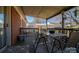 Covered patio featuring neutral furniture, green railing, and a relaxing spot for enjoying outdoors at 605 Castlewood Dr, Gastonia, NC 28056
