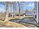 Expansive backyard features mature trees and a storage shed at 8419 Belstead Brook Ct, Charlotte, NC 28216