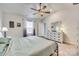 Bedroom with ceiling fan, dresser and ensuite bath at 908 Morien St, Richburg, SC 29729