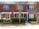 Charming brick townhome exterior featuring a well-maintained front yard and inviting entrance at 915 Tj Dr, Monroe, NC 28112