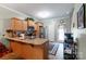 Functional kitchen featuring stainless steel appliances and a breakfast bar counter top at 915 Tj Dr, Monroe, NC 28112
