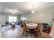 Open layout combines the dining area and living room for seamless entertaining at 915 Tj Dr, Monroe, NC 28112