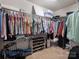 Walk-in closet with an abundance of shelving and hanging storage for optimal organization at 9611 Rayneridge Dr, Huntersville, NC 28078
