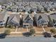 Inviting traditional-style home with brick and siding exterior, manicured lawn, and covered front porch at 9611 Rayneridge Dr, Huntersville, NC 28078