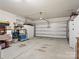 Spacious two car garage that is clean, bright, and ready for customization at 9611 Rayneridge Dr, Huntersville, NC 28078
