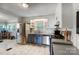 Bright kitchen with stainless steel appliances, tiled floors, and a functional layout for cooking and dining at 1001 E 8Th Ave, Gastonia, NC 28054