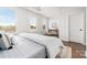 Bright primary bedroom with tray ceilings, natural light, and views to the outdoors at 110 Wesser St, Davidson, NC 28036