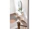 Home entryway featuring console table, mirror, modern decor, and view of dark wood staircase at 110 Wesser St, Davidson, NC 28036