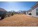 Expansive backyard offers ample space for recreation and relaxation, with manicured lawn and elegant landscaping at 11031 Larkslea Ln, Charlotte, NC 28278