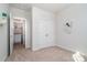This bedroom showcases a closet and laundry room featuring a washer and dryer at 11537 Red Rust Ln, Charlotte, NC 28277