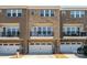 Beautiful brick townhomes with balconies and garages at 11537 Red Rust Ln, Charlotte, NC 28277